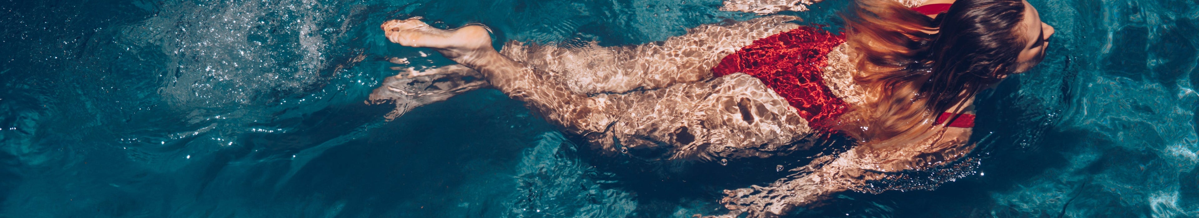 Woman red bikini swimming